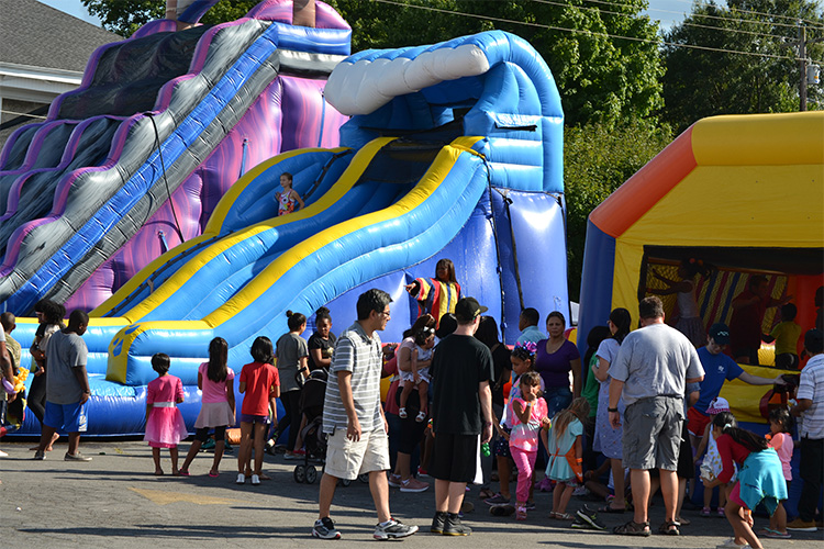 Children playing on slides at the Family Fun Fest 2018